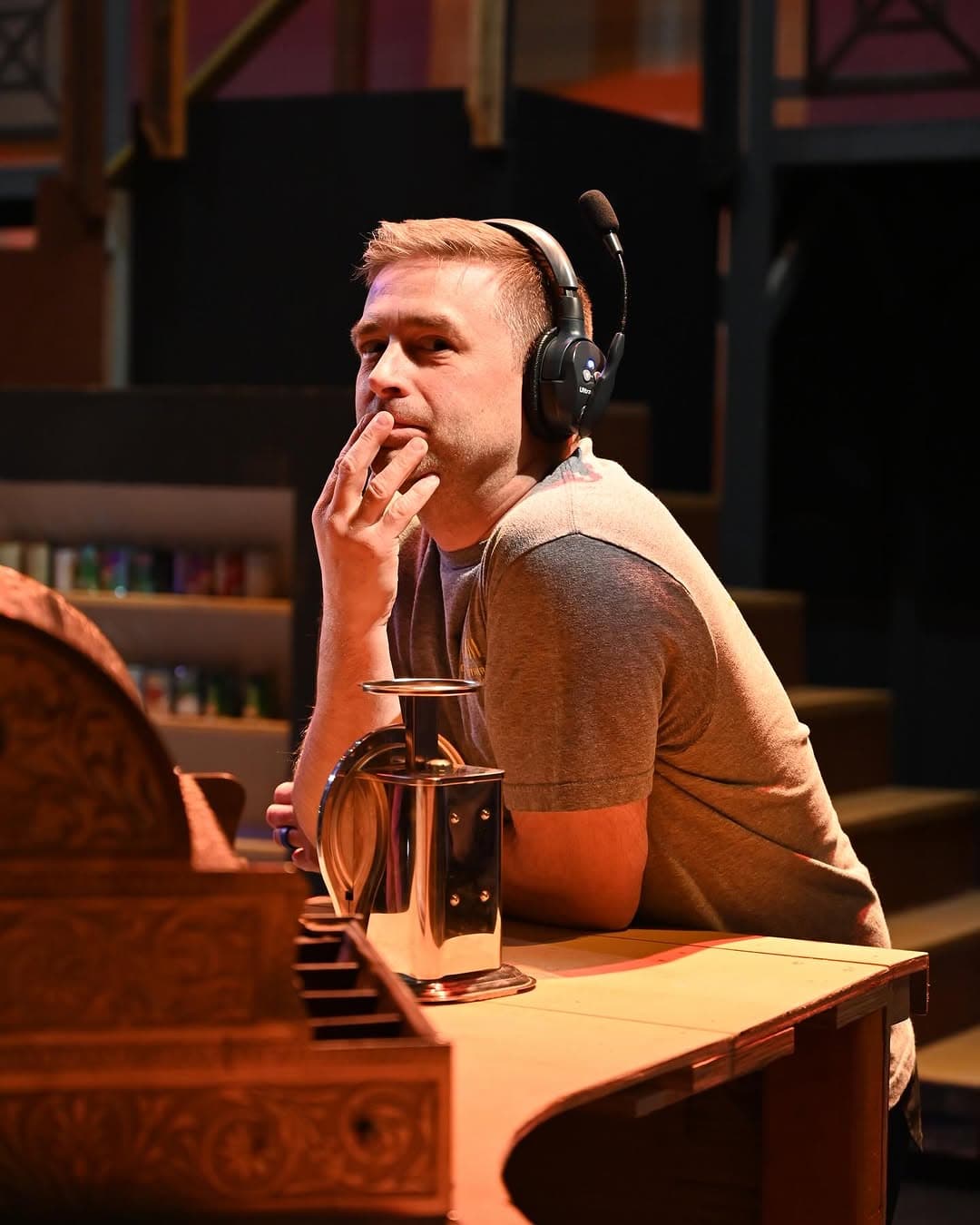 Kimbo at the theatre with a stage headset